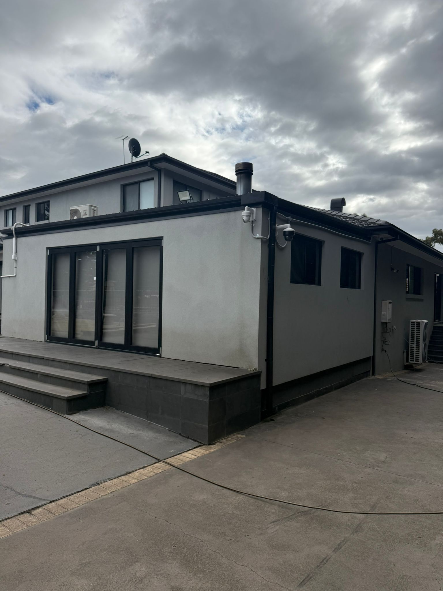 Exterior surface before pressure cleaning Melbourne — weathered and stained